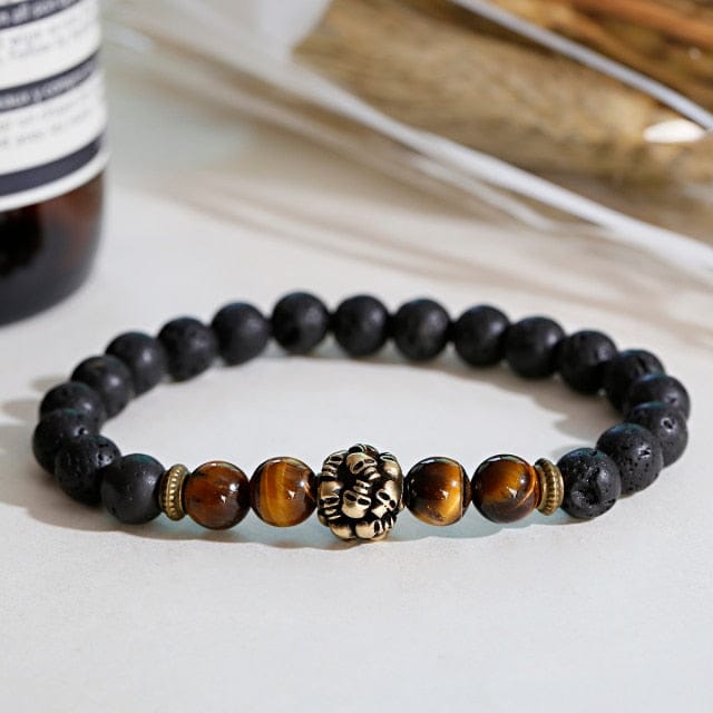 A skull head bracelet with black beads placed on table for photoshoot